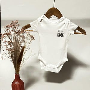 Baby bodysuit with saying &quot;But first Milk&quot; | Birth gift | Personalized baby clothes | Gender reveal | Baby gift | Baby style | Design