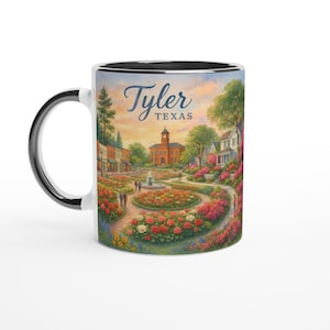May include: A white ceramic mug with a black interior and handle. The mug features a colourful illustration of Tyler, Texas, with the city's name in script. The design includes a rose garden, buildings, and a fountain.