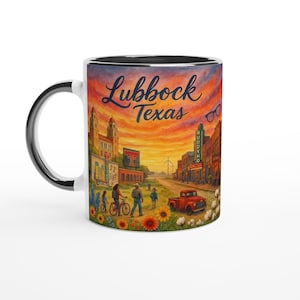 May include: White ceramic mug with a black interior and handle, featuring a colorful illustration of Lubbock, Texas. The design includes a sunset, buildings, people, and the text "Lubbock Texas."