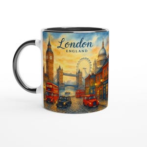 May include: White ceramic mug with a black interior and handle, featuring a colorful illustration of London landmarks, including Big Ben, the London Eye, and red double-decker buses. The text "London ENGLAND" is displayed on the mug.