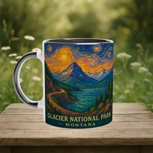 May include: White ceramic mug with a black interior and a silver handle. The mug features a vibrant landscape painting of Glacier National Park, Montana, with a starry sky, mountains, and a lake. The text "Glacier National Park Montana" is printed on the mug.