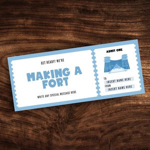 May include: A blue and white ticket with the text "Get Ready! We're Making a Fort" and "Admit One". The ticket has a drawing of a fort made of blankets and chairs.
