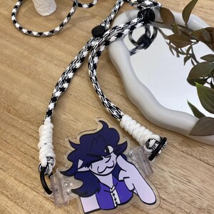 Inspired Thinker™ 携帯電話クリップ ストラップ付き (女性用)