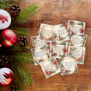 May include: A set of nine Christmas cards featuring poinsettia flowers and scripture verses about the birth of Jesus. The cards are printed on a textured paper with a vintage look.