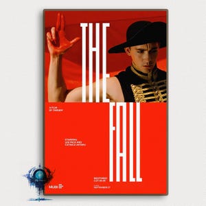 May include: A film poster for the movie "The Fall", directed by Tarsem Singh. The poster features a man wearing a black hat against a red background with the film title in white letters.