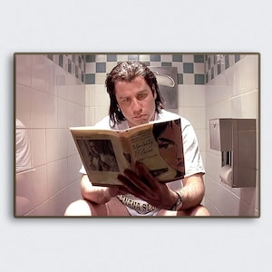 May include: A man sits on a toilet in a bathroom, reading a book titled "Modesty Blaise". The bathroom has white tiled walls and a checkered floor.