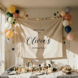 May include: A birthday party scene with a banner that reads "Welcome to Olivia's Birthday Party!" Balloons in various colors, including yellow, pink, and blue, decorate the background. A table is set with food and tableware.