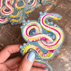 Autocollant serpent avec accents holographiques