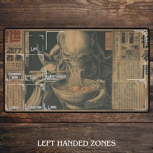 May include: A rectangular playmat featuring a detailed illustration of a creature eating noodles. The mat has a vintage aesthetic with Japanese text and English labels. The text "LEFT HANDED ZONES" is at the bottom. The playmat is designed for left-handed players.