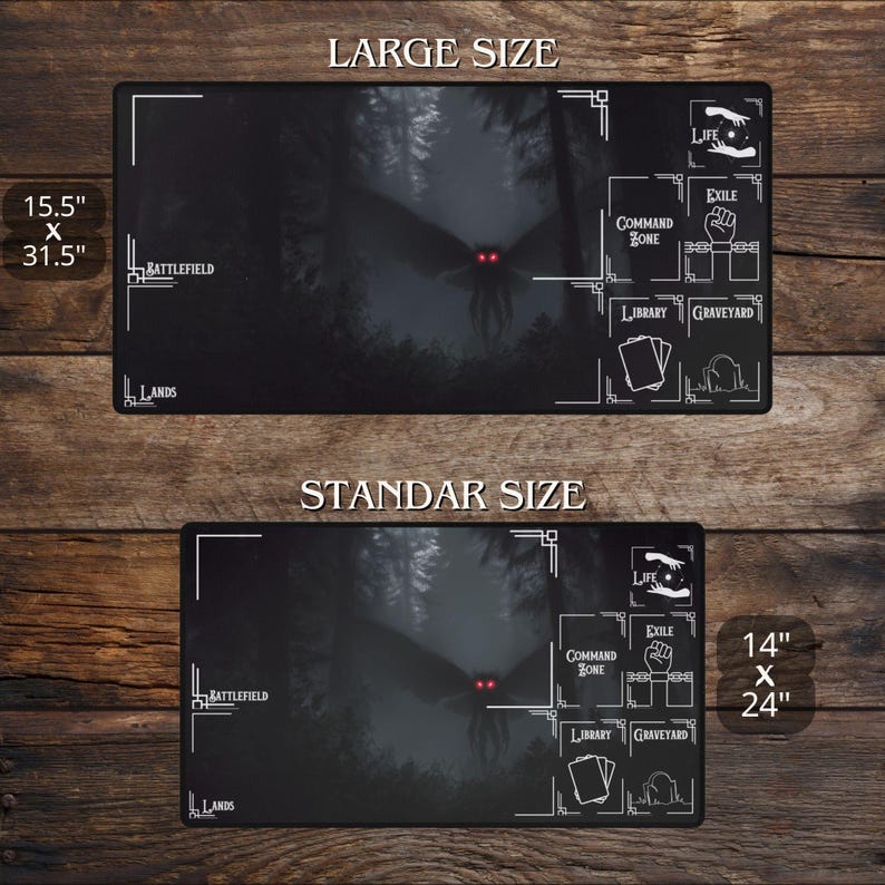 May include: Two black playmats with a forest scene and a moth-like creature with red eyes. The large mat is 15.5" x 31.5", and the standard mat is 14" x 24". Each mat has game zone labels.