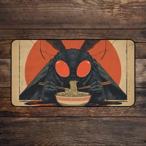 May include: A rectangular graphic features a black moth-like creature with large red eyes, eating noodles from a bowl with chopsticks. The background includes an orange sun and a tan border, creating a unique and eye-catching design.
