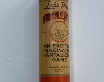 Vintage Canister of Let’s Play Fiddlestix  with Directions