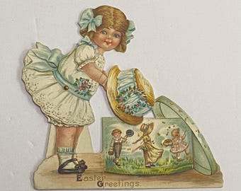 Antique Die Cut Mechanical Easter Card - Girl Taking Easter Bonnet out of Hat Box