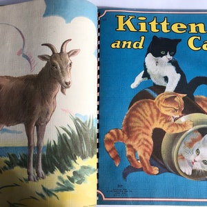 May include: An illustrated book titled "Kittens and Cats" with a brown goat on the left page and a black and white cat, an orange tabby cat, and a white kitten on the right page.