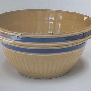 Vintage 10.5” Yellow Ware Bowl with Blue and White Stripes, Scallop or Petal Design on Bottom