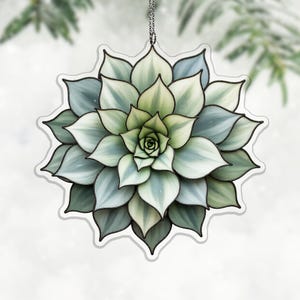 Puede incluir: Un juego de tres tazas de cerámica con un acabado mate moteado. Las tazas son en tonos crema, gris claro y gris oscuro. Cada taza tiene un diseño simple y moderno y un asa redondeada.