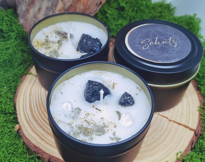 Protective ritual candle in a tin