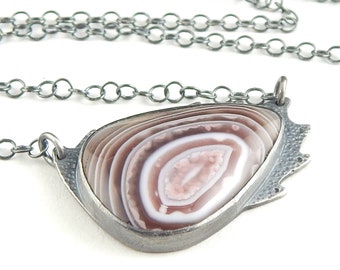 Botswana agate necklace, bezel-set stone, beautiful banded stone with purple and pink, metalwork sterling silver necklace.