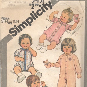 May include: A sewing pattern for making baby clothes. The pattern includes four different styles of baby onesies, with a teddy bear and the text "Simplicity 5431 $2.00" on the front.