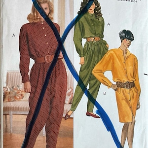 May include: Vintage sewing pattern featuring illustrations of three different jumpsuit and dress designs. The pattern includes a red jumpsuit with a brown belt, a green jumpsuit with a brown belt, and a yellow dress with a brown belt. The pattern is labeled "Butterick Fast & Easy."