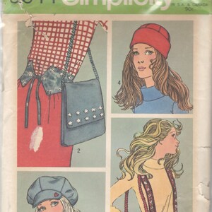 May include: A vintage sewing pattern for a women's outfit with a red and white gingham shirt, a blue denim bag with white stars, a red hat, and a red and white floral print bag. The pattern number is 9644 Simplicity.