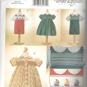 May include: A sewing pattern for a child's dress and two outfits. The pattern includes a green plaid dress, a yellow floral dress, a red and white outfit with a sailboat design, and a green and white outfit with a diamond pattern.