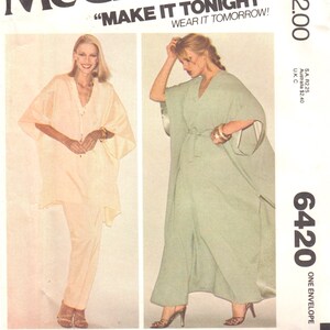 Può includere: Busta del modello di cucito McCall's con due donne che indossano abiti. Il testo "MAKE IT TONIGHT" e "WEAR IT TOMORROW!" è visualizzato. Il numero del modello è 6420. La busta include un abito color pesca chiaro e un abito verde chiaro.