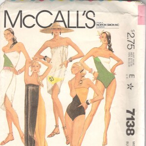 May include: A vintage McCall's sewing pattern for a swimsuit, featuring four different styles. The pattern is for size 14, bust 36. The pattern is from Bob Mackie and is titled "Quick & Easy".