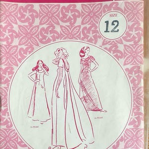 May include: A vintage Patterns Pacifica sewing pattern packet. The pink packet features a floral design and illustrations of three dresses. The size 12 pattern includes illustrations of the front and back of the dresses.
