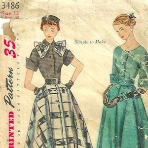 Può includere: Modello di cucito vintage per un abito con gonna a quadri e un abito verde tinta unita. Il modello è di Simplicity ed è taglia 12. Il modello si chiama "Facile da fare" ed è stampato su ogni pezzo del modello.