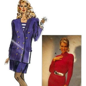 May include: A purple double-breasted blazer with gold buttons and a matching skirt. The blazer has a long, fitted silhouette and a collar. The skirt is knee-length and has a straight cut. The model is wearing a white striped shirt underneath the blazer.