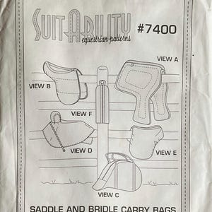 May include: A white paper sewing pattern envelope titled SUITABILITY #7400 equestrian patterns. The front features black line drawings of saddle covers and carry bags labeled View A, B, C, D, E, and F. The text reads SADDLE AND BRIDLE CARRY BAGS AND SADDLE COVERS PATTERN.
