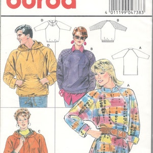 May include: Burda sewing pattern number 4738. The pattern includes instructions for making four different tops. The first top is a long-sleeved, hooded sweatshirt. The second top is a long-sleeved, round-neck sweater. The third top is a long-sleeved, round-neck sweater with a contrasting pattern on the sleeves. The fourth top is a long-sleeved, round-neck sweater with a contrasting pattern on the sleeves and a long, flowing hem.