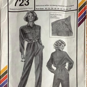May include: A vintage sewing pattern for a jumpsuit, featuring a black and white illustration of a woman wearing the garment. The pattern is labeled "Stretch & Sew" and "723" and includes instructions for sewing machines and sergers. The bust sizes are listed as 30-32-34-36-38-40-42-44-46.