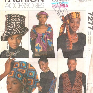 May include: A vintage McCall's Fashion Accessories pattern cover featuring various African-inspired headwear, shawls, and a vest. The designs showcase geometric and floral patterns in vibrant colors. The text "MCCALL'S FASHION ACCESSORIES" is prominently displayed.