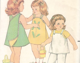 1960s Butterick 3685 Toddlers Criss Cross Back Reversible Wrap Dress Jumper Pants Pattern Girls Vintage Sewing Size 4 Breast 23 UNCUT