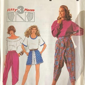 May include: Simplicity sewing pattern featuring illustrations of women's clothing. The pattern includes designs for three different outfits: a pink tulip pant, a white top with blue shorts, and a magenta top with floral pants.