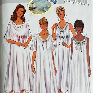May include: Butterick sewing pattern 3928 for nightgowns in sizes XS, S, and M. The envelope features illustrations of four white nightgowns with varying sleeve lengths, lace trim, ribbon bows, and ruffled hems. A small lighthouse sticker is attached.