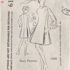 May include: A vintage Spadea Designer Pattern 61859 for a dress by Suzy Perette, size 14. The paper envelope features a black and white line drawing of a dress with a high neckline and long sleeves, shown from front and back views, with text.