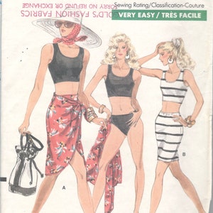 May include: Vogue Patterns sewing pattern featuring illustrations of three women in swimwear and summer outfits. The pattern includes a sarong, a striped skirt, and a black crop top. The text "VERY EASY" is visible.