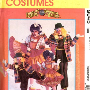 May include: A vintage sewing pattern for four clown costumes. The pattern is for a woman, a man, and two children. The pattern is from McCall's Costumes and features the Ringling Bros. and Barnum & Bailey Circus logo. The pattern number is 9045.