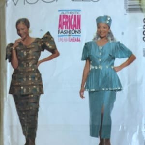 May include: A sewing pattern for two outfits. The first outfit is a brown and gold patterned top and pants. The second outfit is a teal blue top and skirt with a white trim. The pattern is titled "Authentic African Fashions by Eniola Embara".