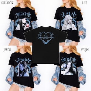 May include: Black graphic t-shirts featuring portraits of female figures with stylized text. The shirts have light blue accents and the names "SULLYOON", "LILY", "JIWOO", and "KYUJIN". The back of the shirt has a heart design with the text "To you, whom I love the most but hate."