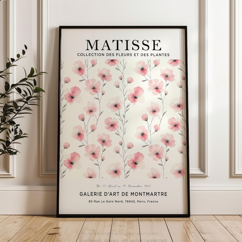 May include: A black and white poster with a pink floral design. The poster features the text "MATISSE" and "COLLECTION DES FLEURS ET DES PLANTES". The poster also includes the text "GALERIE D'ART DE MONTMARTRE" and the address "83 Rue Le Gare Nord, 75942, Paris, France".