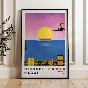 May include: A vintage poster with a sunset over a city skyline and a plane flying overhead. The poster is in a black frame and has the text "HIROSHI NAGAI TOKYO 1973" at the bottom. The colors are yellow, blue, red, and purple.