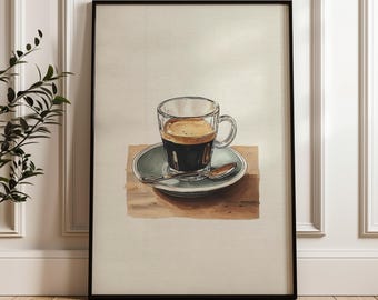 May include: Watercolor art print of a clear glass coffee cup filled with dark espresso, resting on a green saucer with a small spoon. The artwork is framed in a black frame, set against a neutral background.