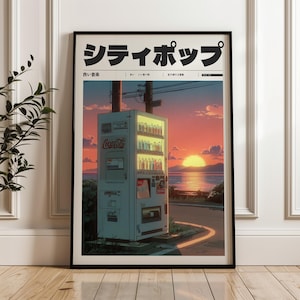 Puede incluir: Impresión artística enmarcada con estética japonesa. La obra representa una máquina expendedora de Coca-Cola iluminada contra una puesta de sol sobre el mar. Texto japonés en la parte superior. La impresión está en un marco negro.
