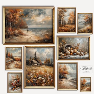 May include: A collection of framed landscape paintings with gold frames. The artwork depicts autumnal scenes with trees, fields, and coastal views. The color palette includes warm tones of orange, brown, and yellow, with cloudy skies. The paintings vary in size and shape.