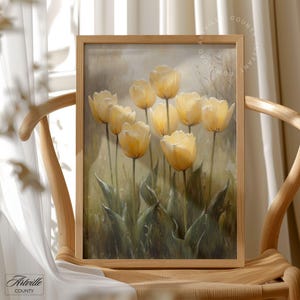 May include: A framed painting of a bouquet of yellow tulips with green leaves against a soft, muted background.