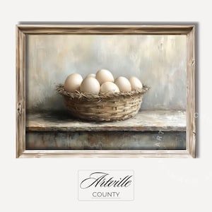 May include: A painting of a rustic wooden frame with a still life of white eggs in a woven basket. The eggs are arranged in a circular pattern and the basket is sitting on a wooden surface. The background is a soft, muted gray.